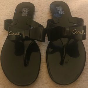 Coach “Pretty” Black flip flops w/Bow